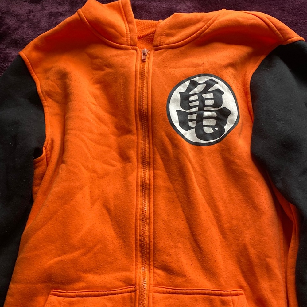 Comfortable dragonball-z sweater. size M-L zip-up in great condition.